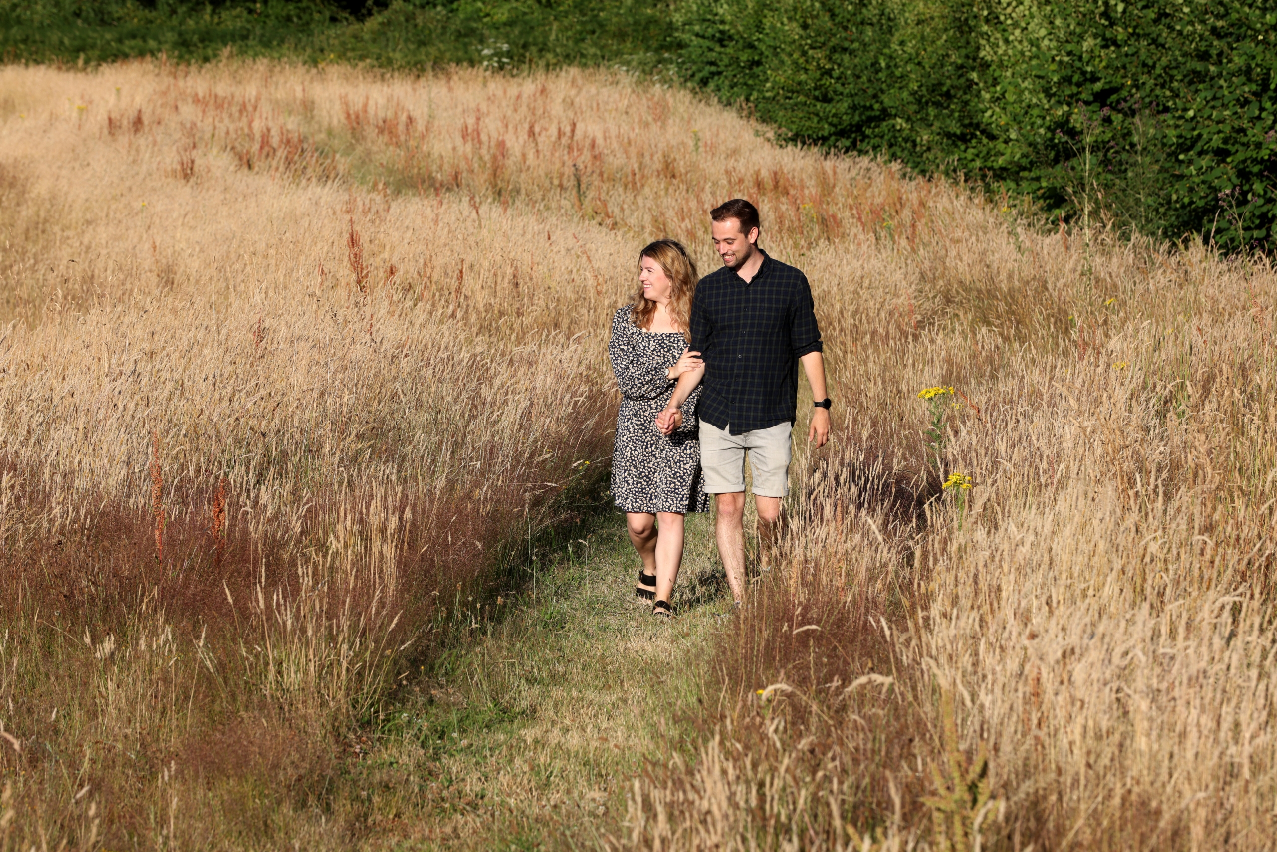 Young couple enjoy walk after using Help to Buy