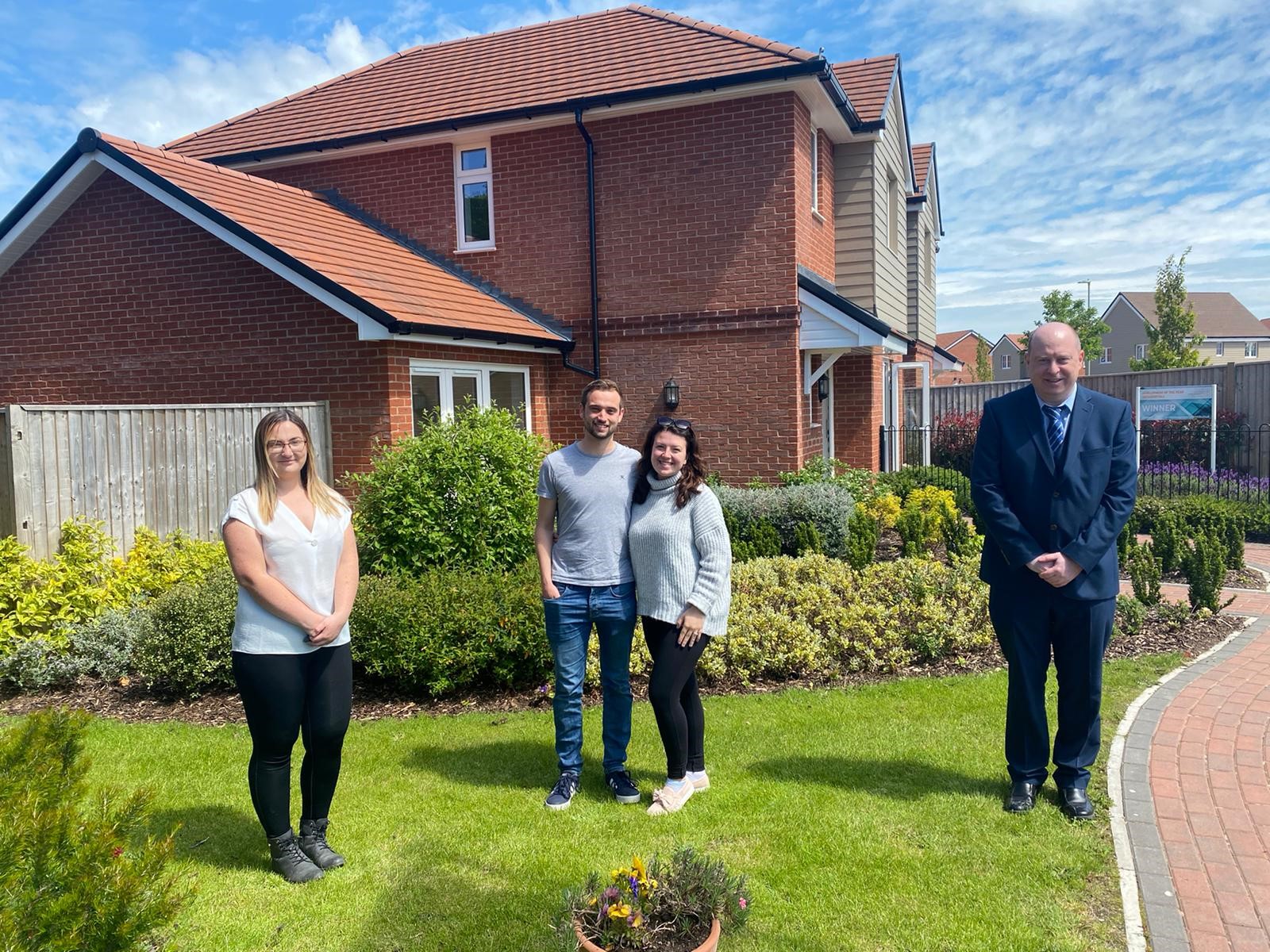 Couple with solicitor learning about Help to Buy