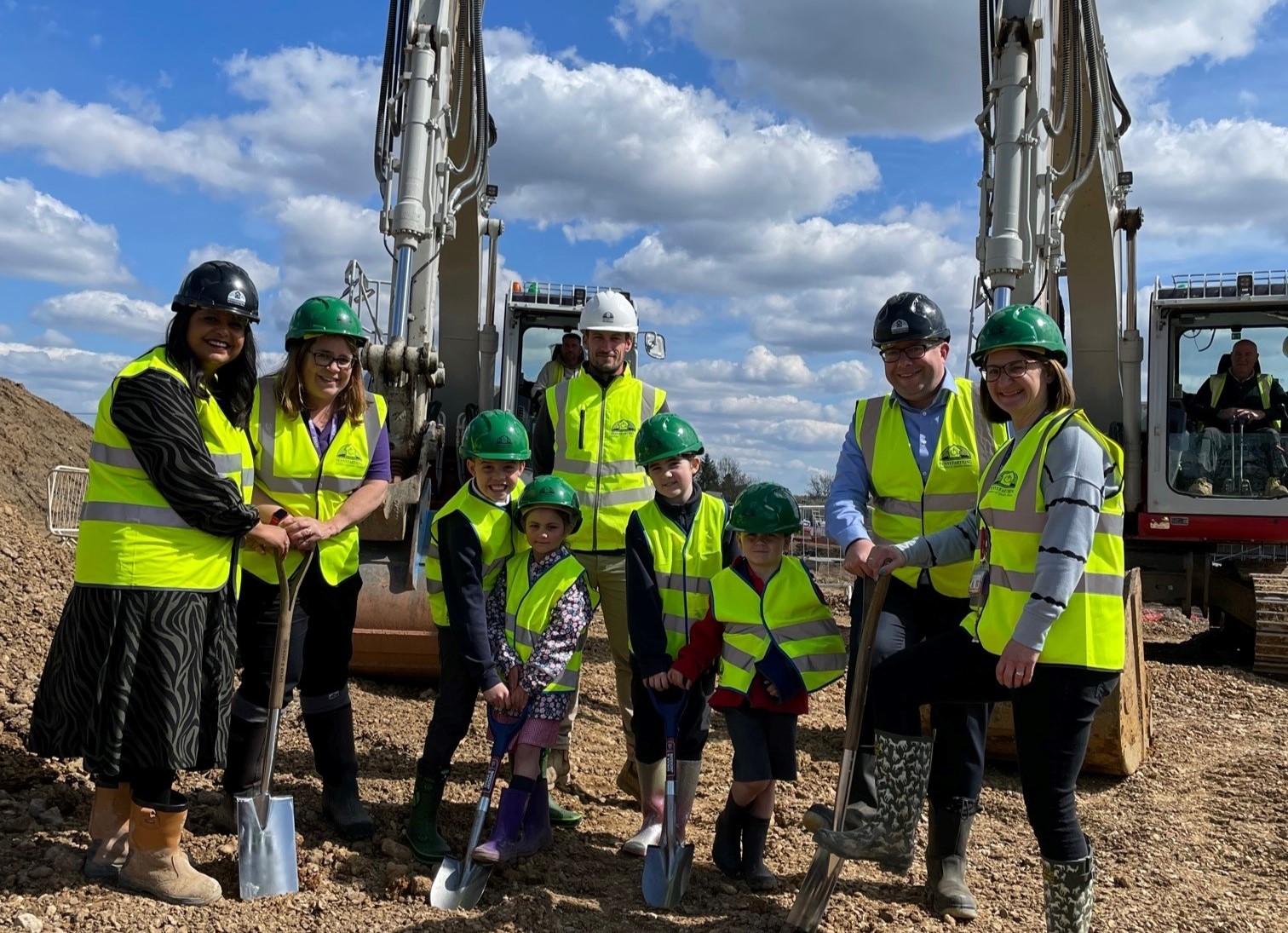 School children help Pennyfarthing Homes break ground at launch of new housing development in Fordingbridge
